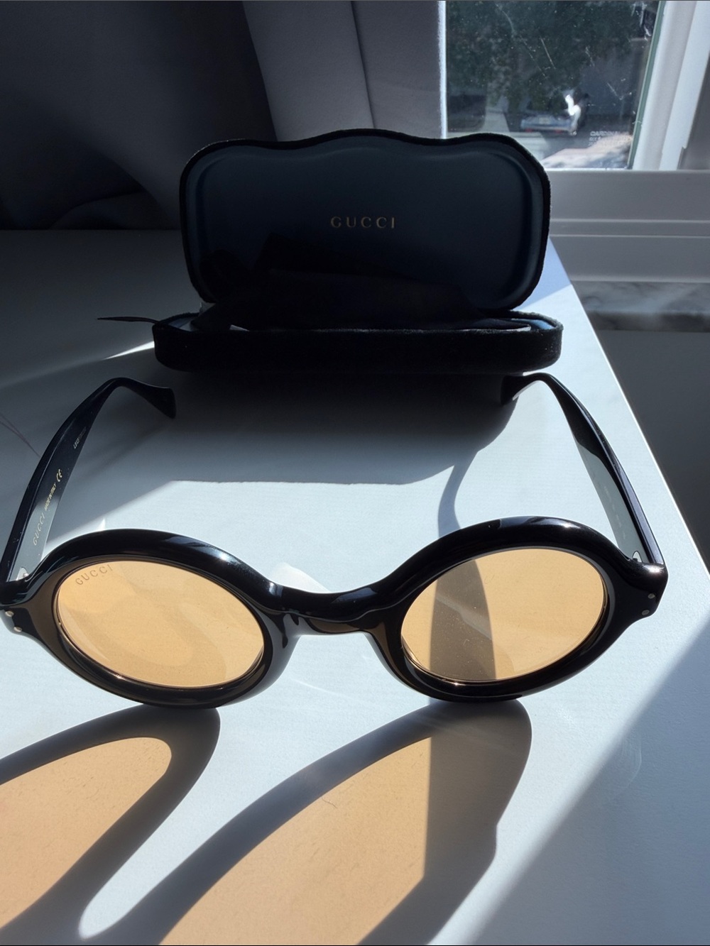 Gucci Black Round Sunglasses with Amber Lenses GG 0871S